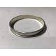 Dust seal retaining ring for front or rear corrector